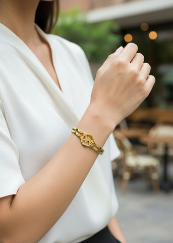 Luxe MK Style Stainless Steel Bangle – Elegant Gold-Tone Bracelet for Women