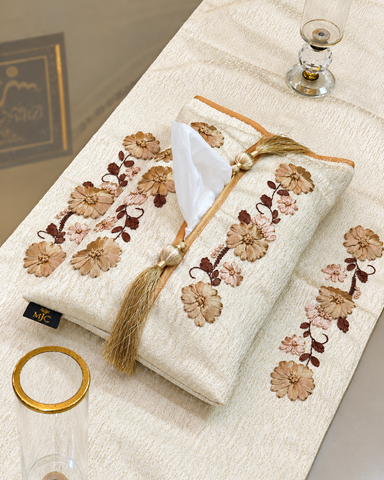 Close-up of Noor floral hand embroidered table runner and matching tissue box cover set